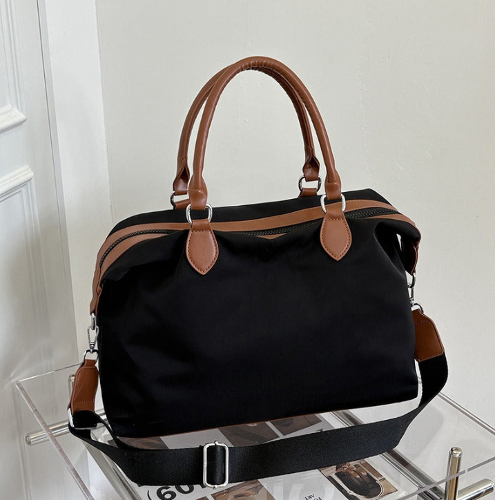 #139.85 Women's new portable outdoor commuter handbag fitness bag